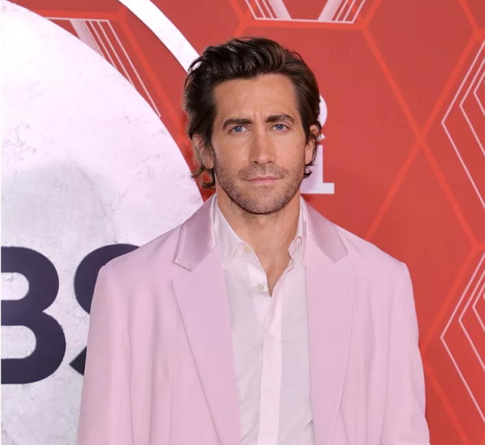 Jake Gyllenhaal wearing a light-pink suit at the Tonys
